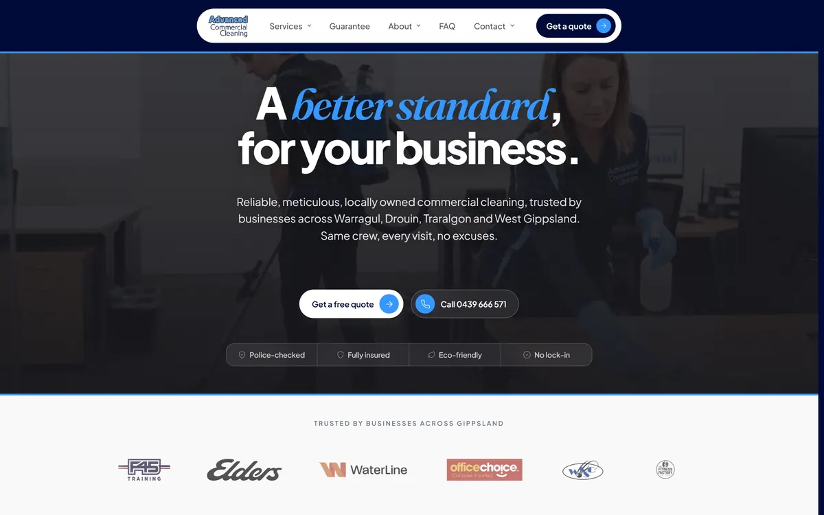 The Advanced Commercial Cleaning home page. Two uniformed cleaners work in an office behind the headline A better standard, for your business, with a Get a free quote button and a phone number.